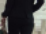 茶パツッな パンツスーツお姉さん